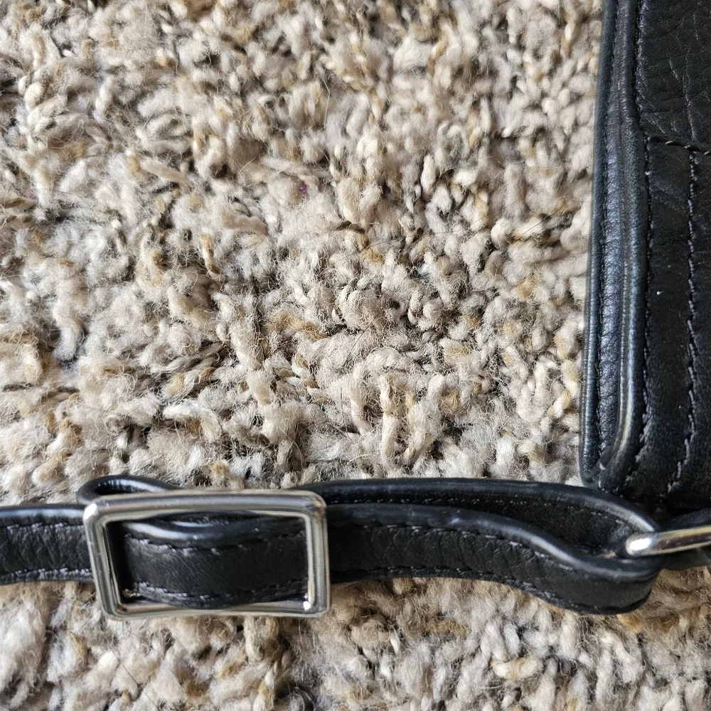 Margot black leather crossbody bag with corner pocket on‎ a front